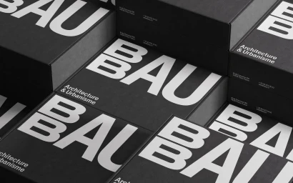 Stacked black rectangular boxes with bold white typography reading BBAU Architecture and Urbanisme.