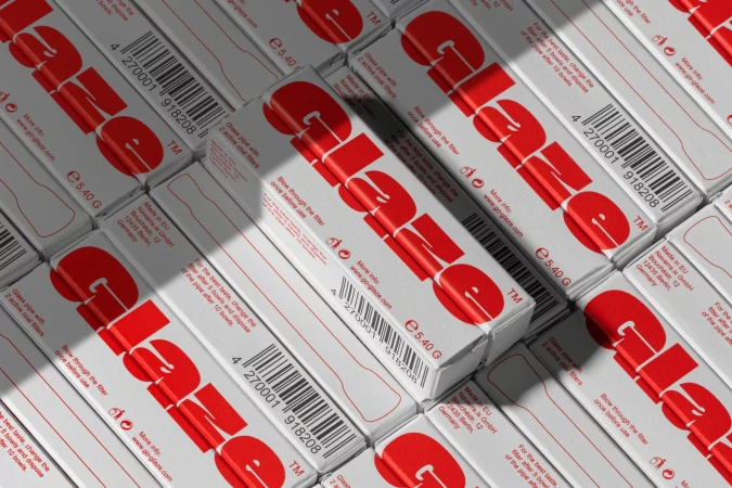 Multiple white boxes of Go-Glaze glass pipe filters with red branding, arranged in a geometric pattern with visible barcodes.