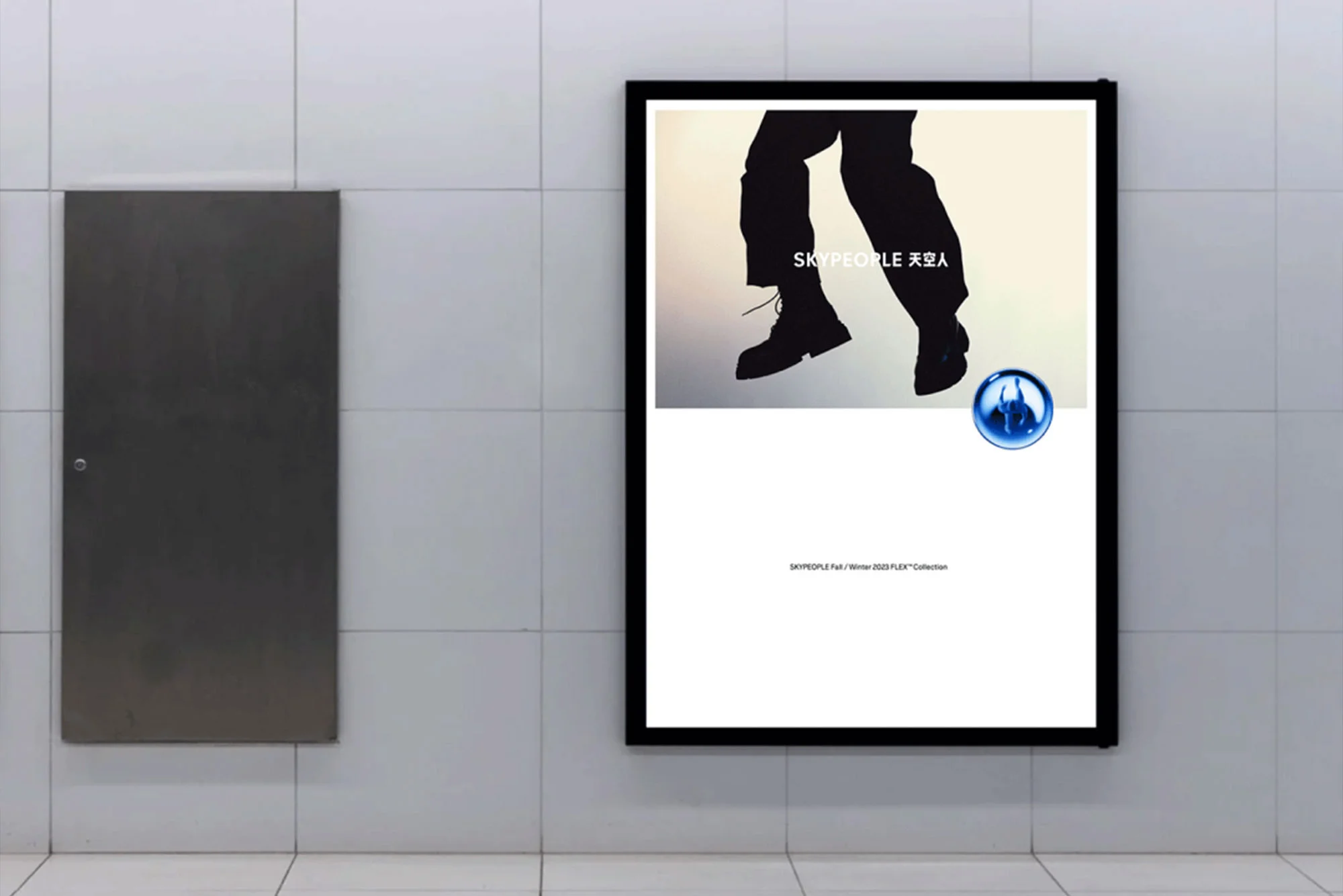 Poster of silhouette of person's legs and feet in black against a bright sky background, mounted on a tile wall.
