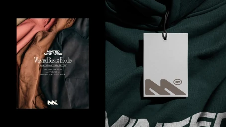 Close-up product display of Minted New York washed basics hoodies featuring typography and brand labels.