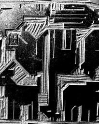 High contrast black and white graphic design featuring textured geometric patterns and embossed architectural lines.