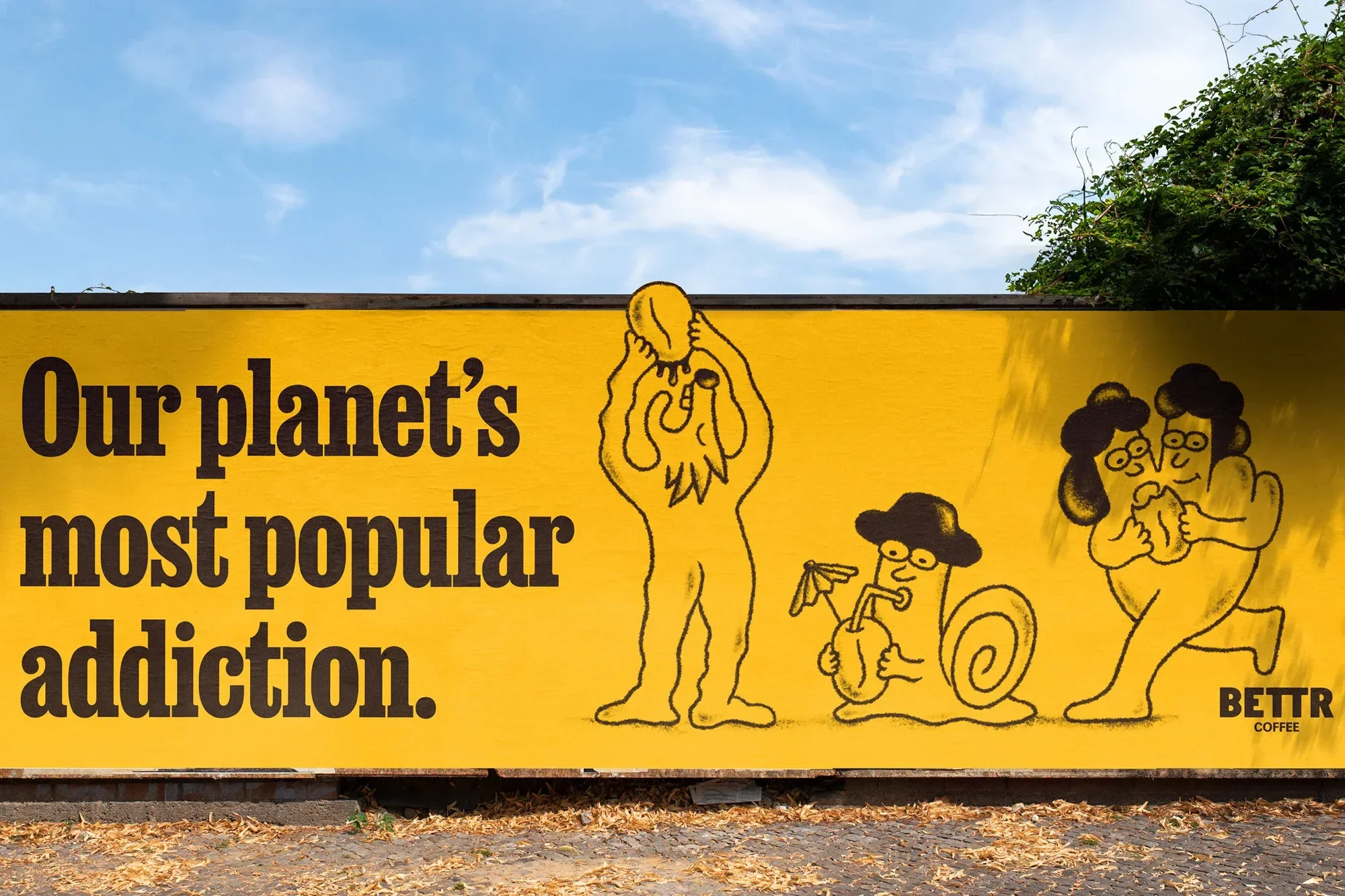 Yellow wall art featuring an illustration of people and a snail with a cocktail, advertising Bettr Coffee against a blue sky background.