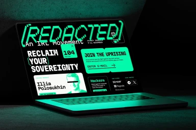 Laptop displaying a black and green digital interface with text on a dark textured surface.