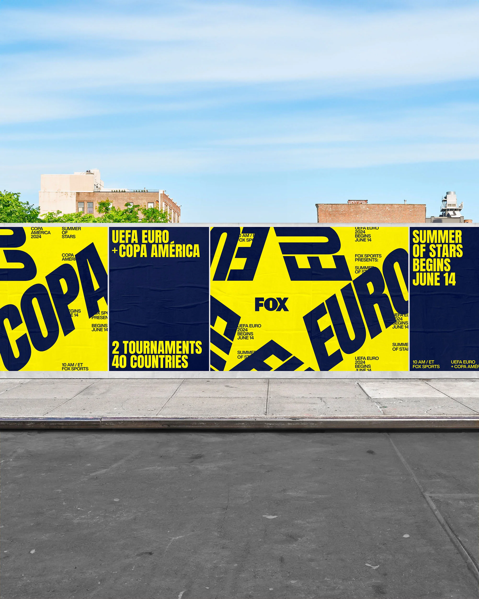 Outdoor advertising featuring soccer tournaments Copa America and UEFA Euro with bold typography and yellow and blue color scheme on city street.