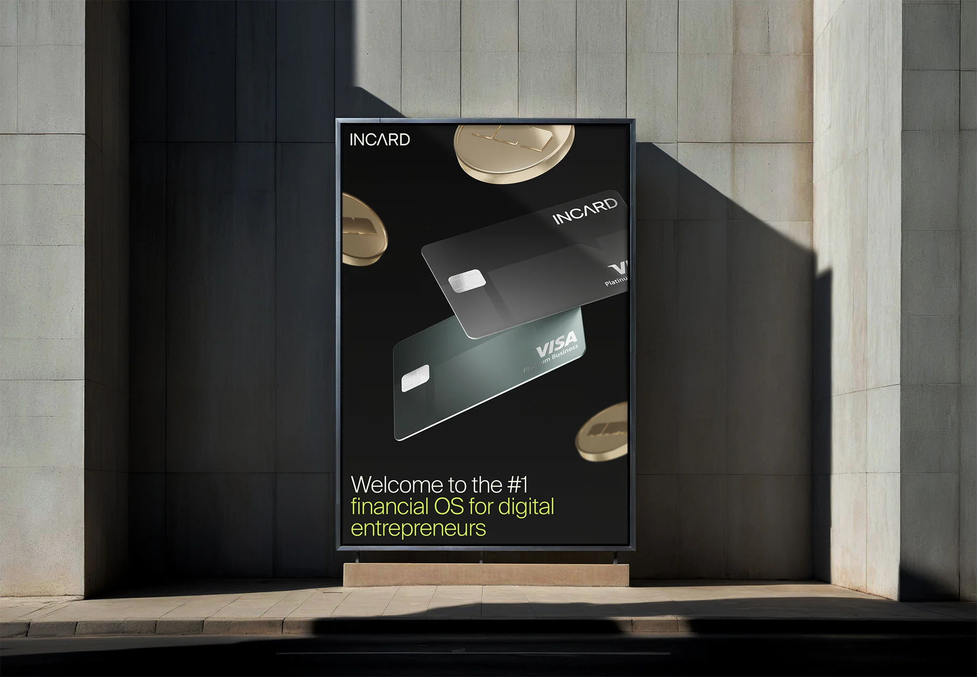 Outdoor advertisement for InCard featuring credit cards and gold coins on a black background, promoting financial solutions for entrepreneurs.