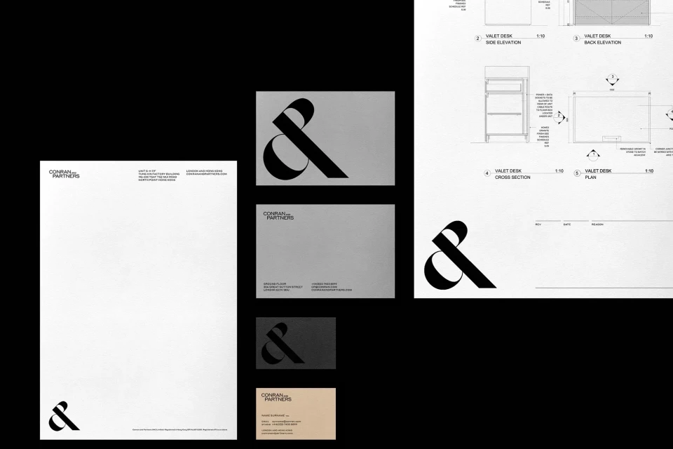 Letterhead, envelopes, and business cards with the Conran and Partners logo, alongside architectural drawings of valet desks.