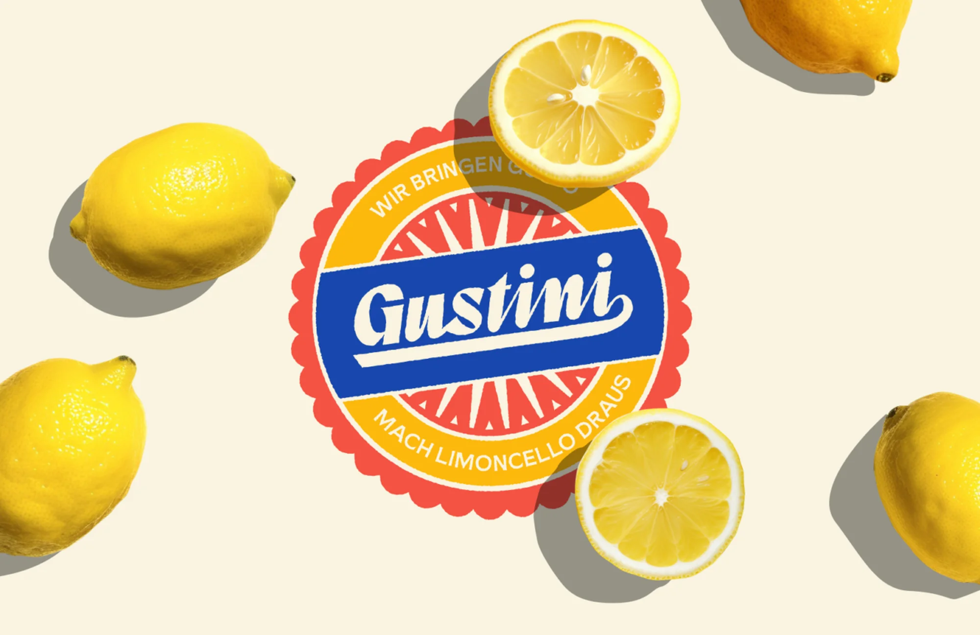 Overhead shot of fresh lemons, whole and halved, arranged around a circular logo with a blue and red design on a cream background.