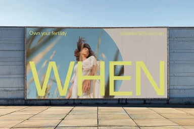 Billboard advertising campaign for WHEN featuring a woman in a white dress standing in tall grass against a blue sky.