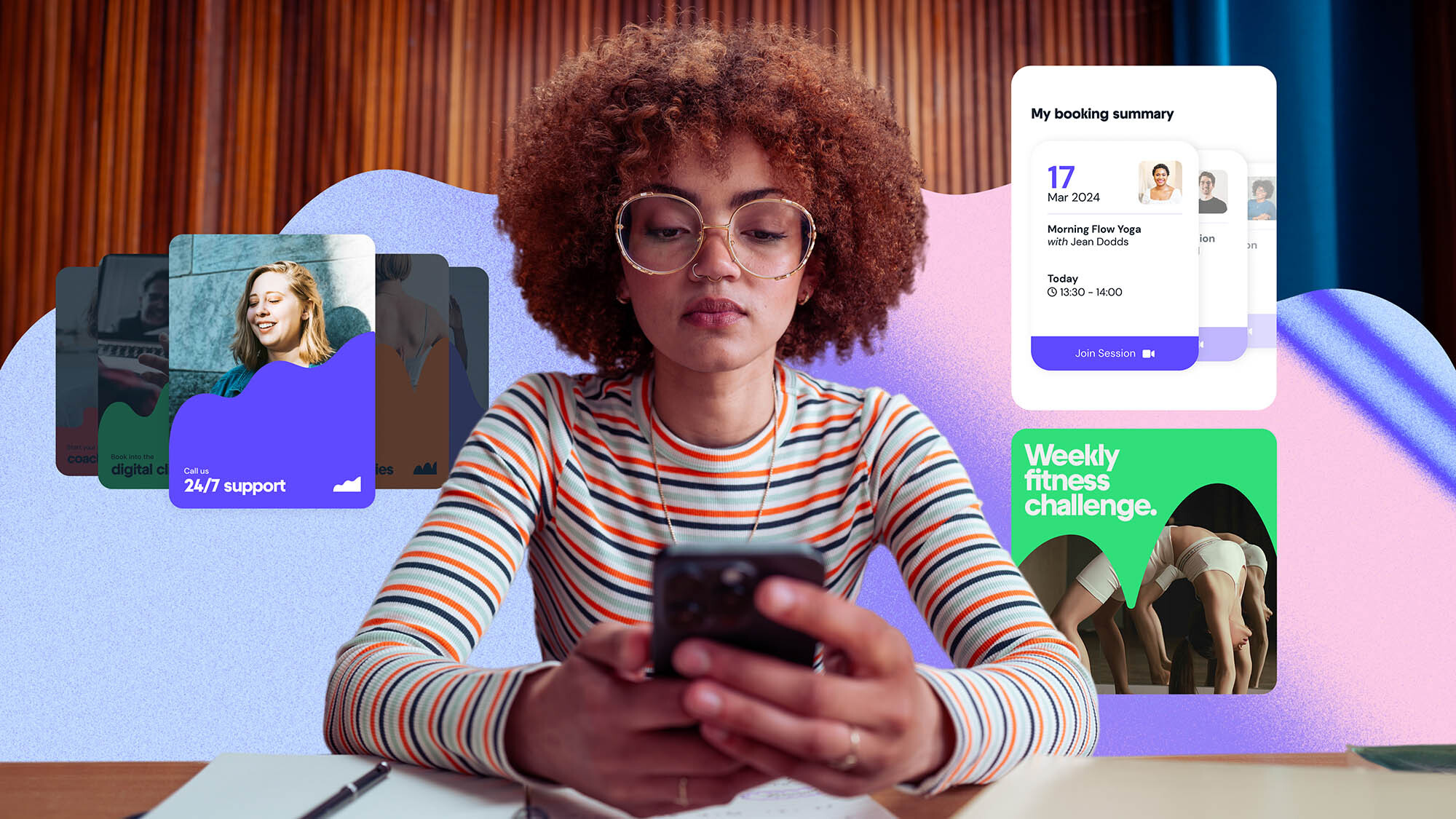 Adult female with afro in a striped shirt uses a smartphone in an indoor setting with colorful digital graphics in the background.