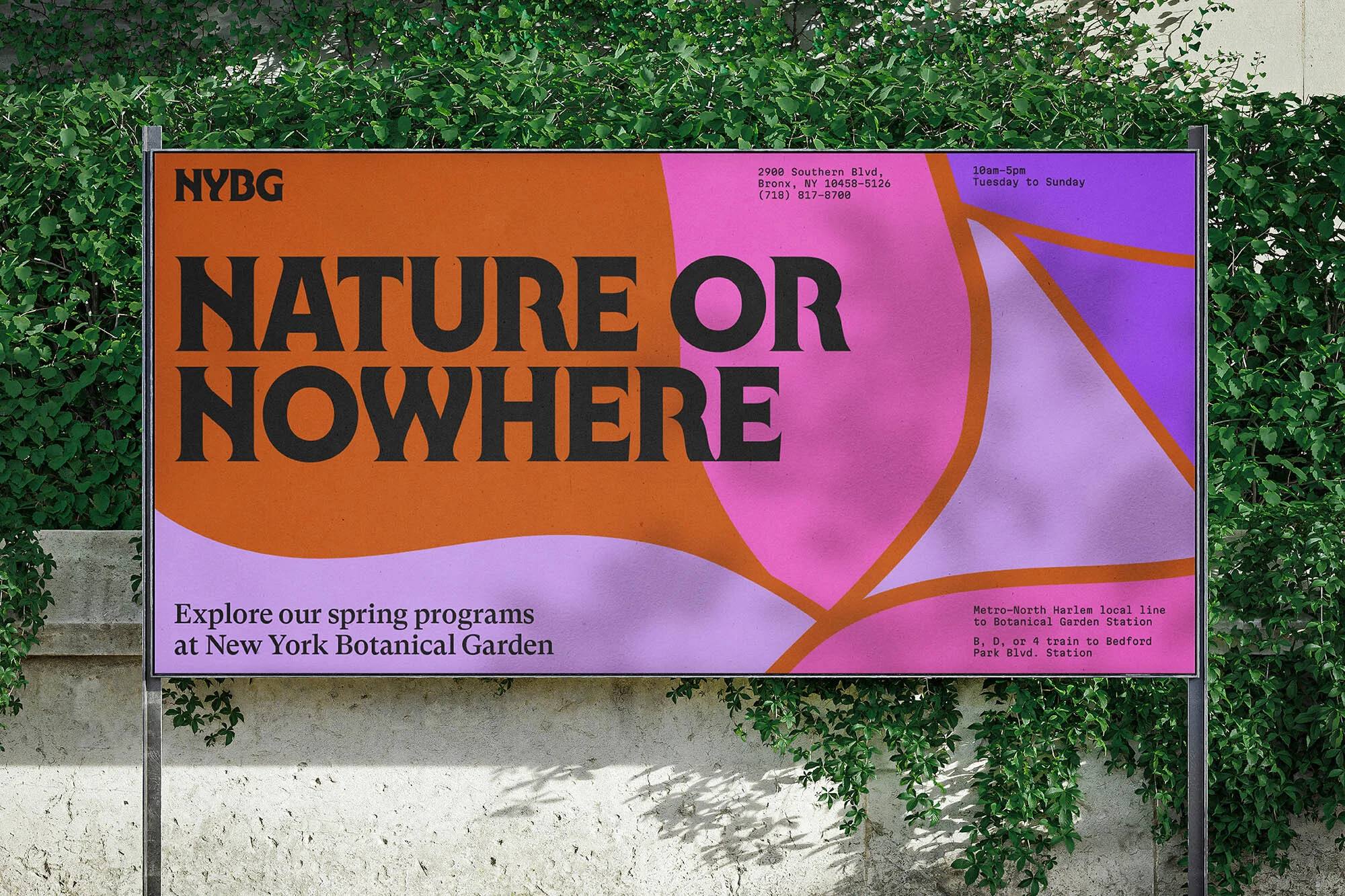 Billboard for New York Botanical Garden event against a green foliage wall. Nature or Nowhere text in orange and black.