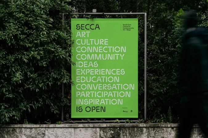 SECCA (South East Centre for Contemporary Art / Bega) poster with art, culture, connection, community, ideas, experiences, education.