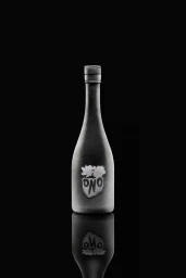 Textured black bottle of Sake Ono centered upright against a dark reflective background.
