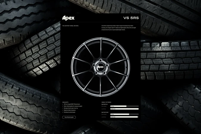 Apex VS 5RS wheel displayed against a backdrop of tires in a studio setting, highlighting its design and construction.