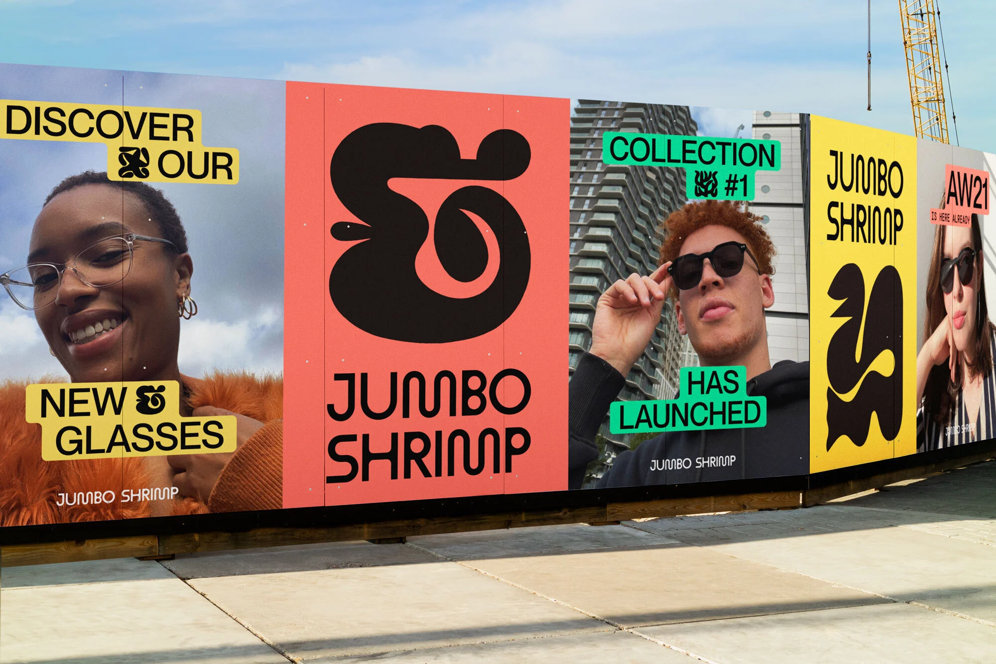 Eye-catching billboard featuring eyewear ad, showcasing Jumbo Shrimp brand with diverse models and bold, colorful graphics.