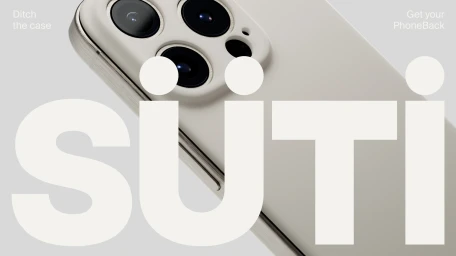 Close-up of a white smartphone featuring a prominent camera array, overlaid with bold white typography spelling SUTI.