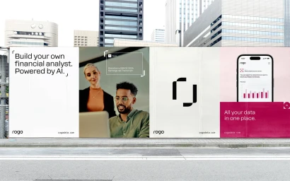 Billboard advertising campaign for Rogo featuring financial analyst imagery and branding on an urban street.