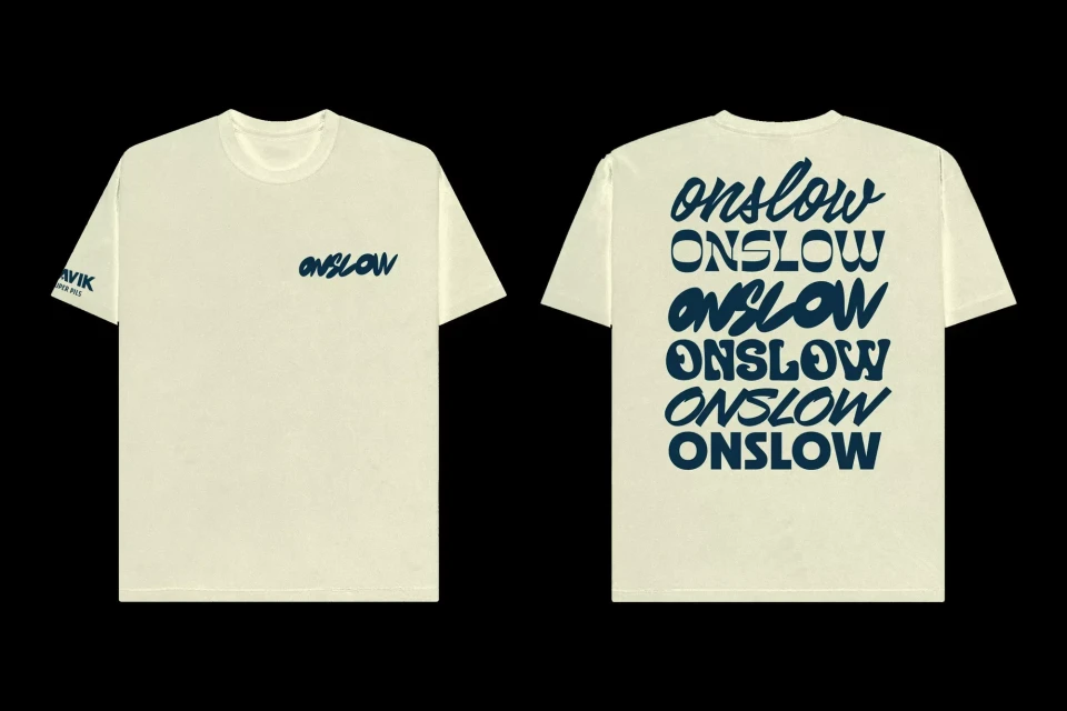 Front and back view of a cream-colored t-shirt with dark blue lettering on a black background. T-shirt is displayed flat.