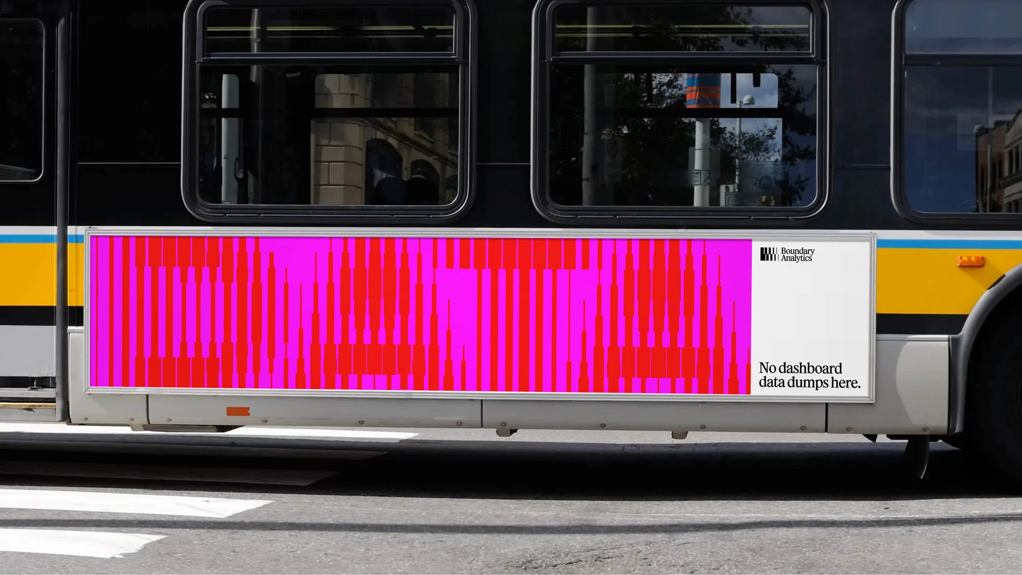 Bus-side advertising featuring a geometric, colorful banner with text "Boundary Analytics" and tagline "No dashboard data dumps here."