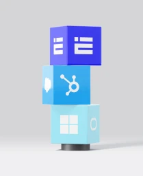 A vertical stack of three blue 3D cubes with white graphic icons displayed on a neutral grey background