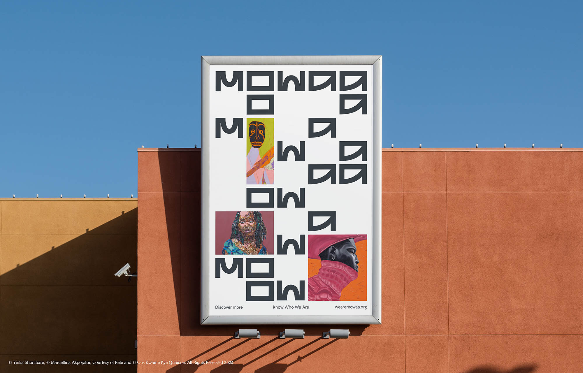 Outdoor billboard featuring portraits of three women with the text "MOWAA Discover more Know Who We Are wearenowaa.org" against a blue sky.