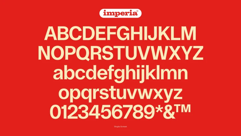 Font design featuring the complete alphabet, numbers, and symbols in a cream color against a solid red background. Typography showcase.