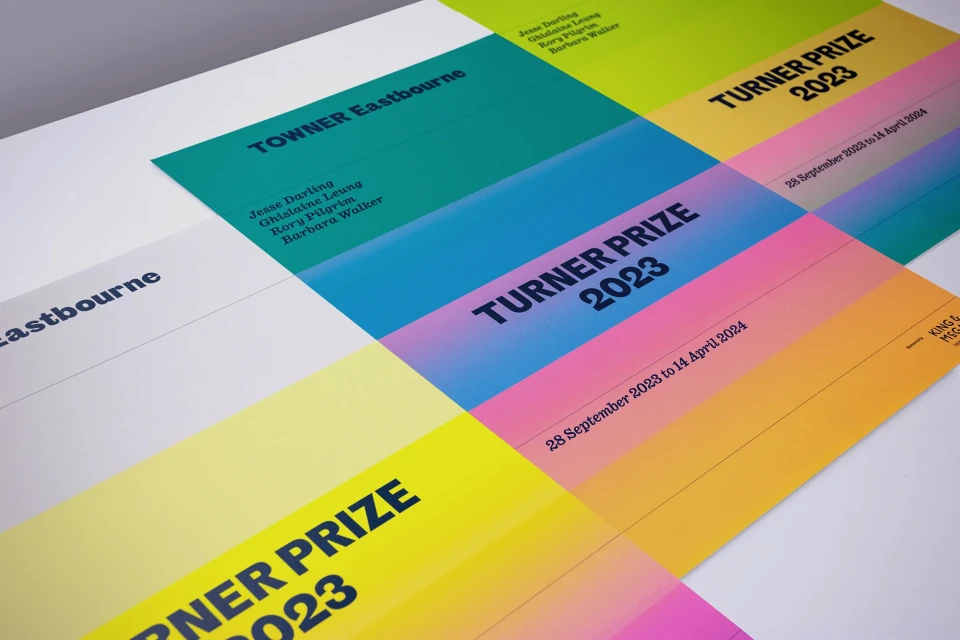 Colorful graphic design posters advertising the 2023 Turner Prize exhibition at Towner Eastbourne; show dates of September 2023 to April 2024.