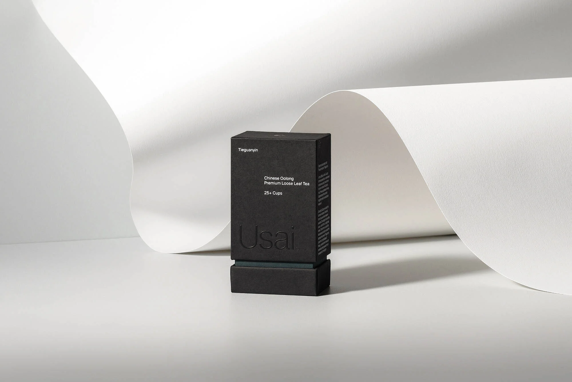 Usai Chinese Oolong tea box sits in a bright studio with a white paper backdrop, perfect for packaging and product photography.