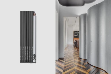 A vertical arrangement of six dark pencils next to a modern interior hallway with curved metallic walls and chevron wood flooring.