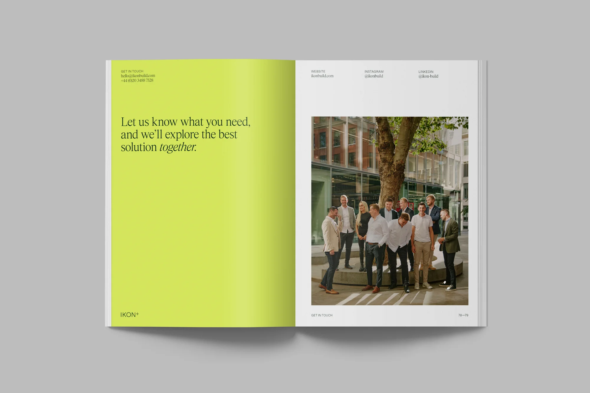 Open magazine features a group of businesspeople standing outdoors in an urban setting, alongside bold graphic design and brand messaging.
