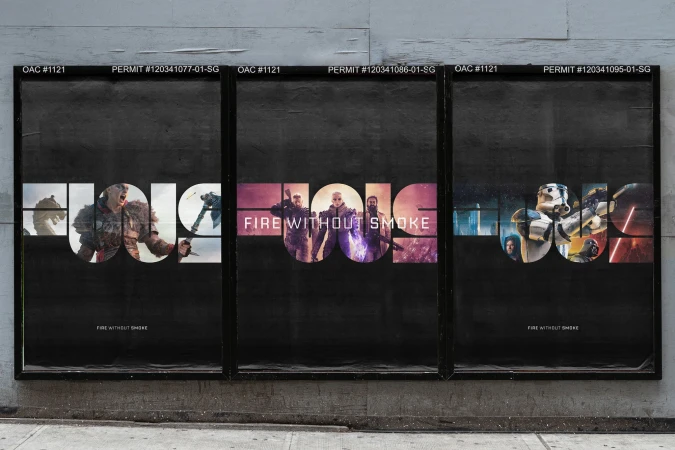 Three black posters advertising 'Fire Without Smoke' are mounted outside, each featuring fragmented images and bold text on a grey wall.