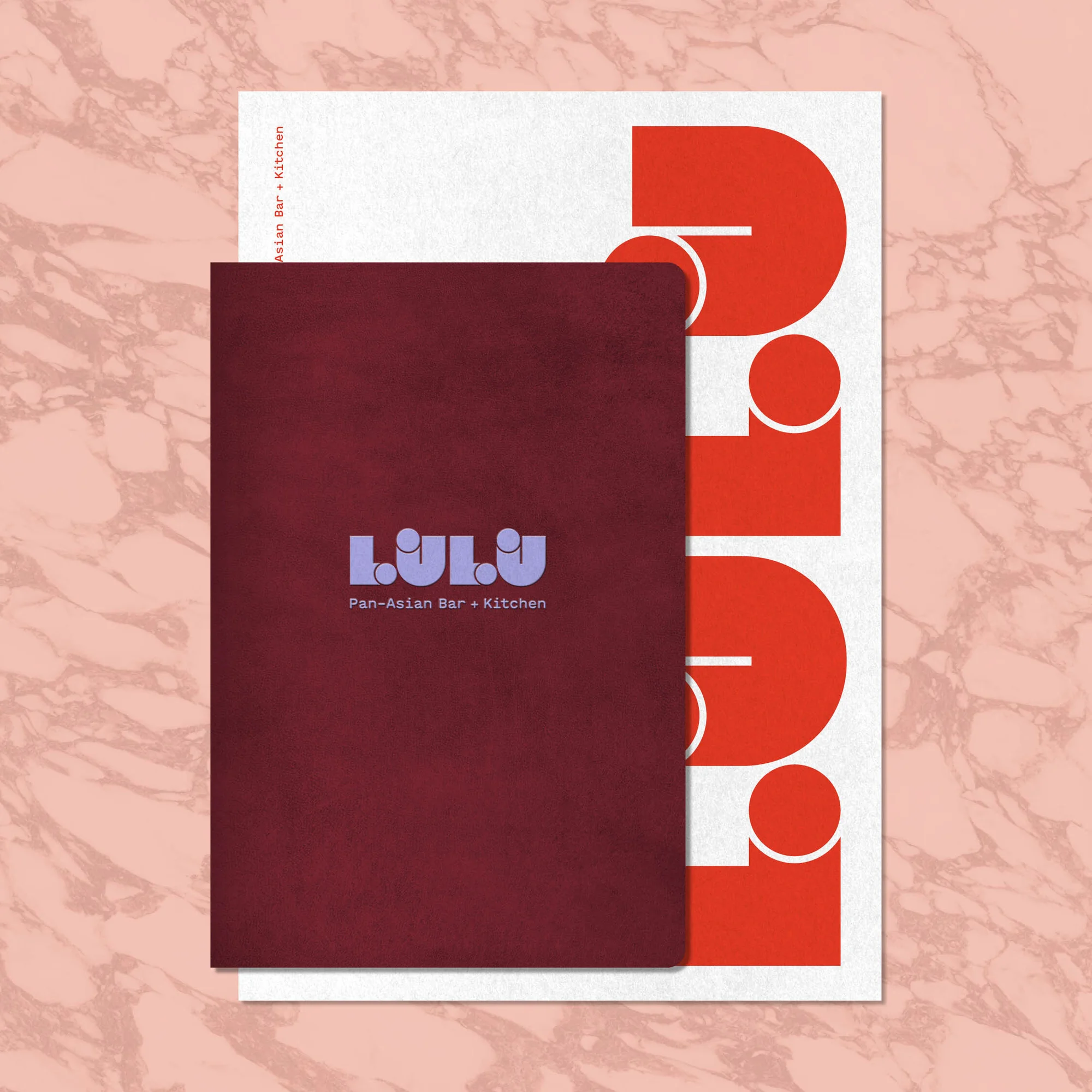 A stack of restaurant menus, featuring a dark red menu with the restaurant name 'LULU' and a second white menu with a modern design.