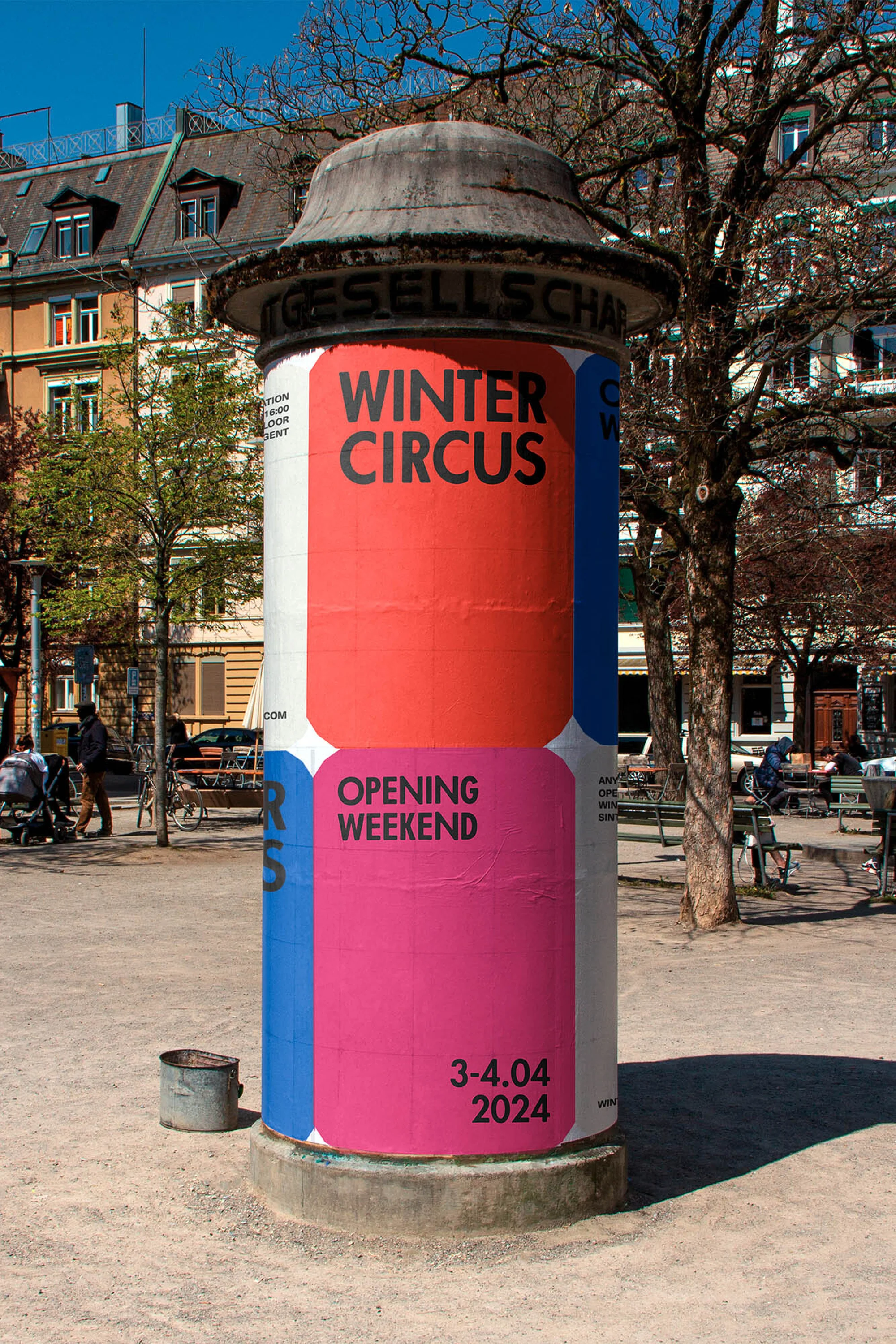 Public advertising column with colorful posters for a winter circus opening, set against a backdrop of city park trees and buildings.