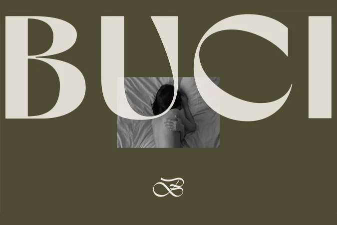 Monochromatic indoor shot of a reclining person on a bed with beige decorative overlay text, set against a muted olive-green backdrop.