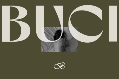 Large serif typography reading BUCI overlaying a black and white image of a person on white bed sheets against an olive background.