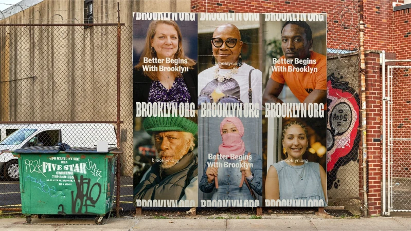 Outdoor posters for Brooklyn.org featuring portraits of five diverse people on the street with a dumpster and chain-link fence.