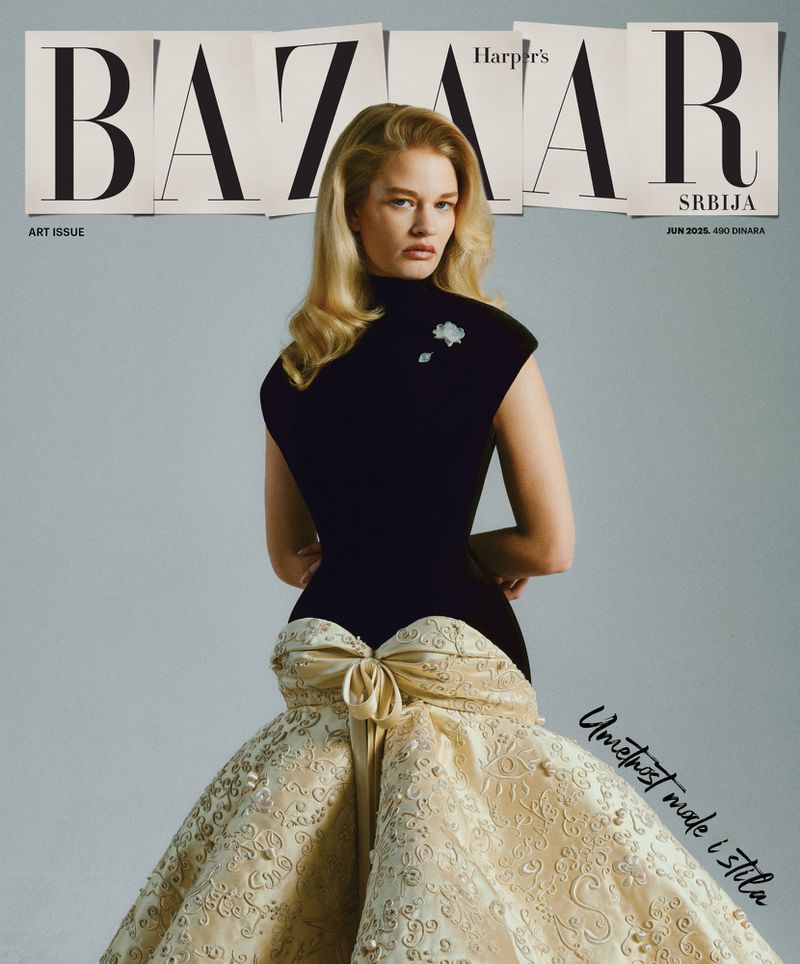 Bazaar Serbia cover featuring a poised adult woman wearing a black bodice and cream-colored formal gown against a grey backdrop.