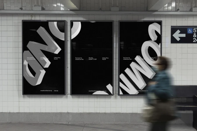 Three posters advertise architecture gala in subway station. Black background features white 3D text. Blurred person passes by.