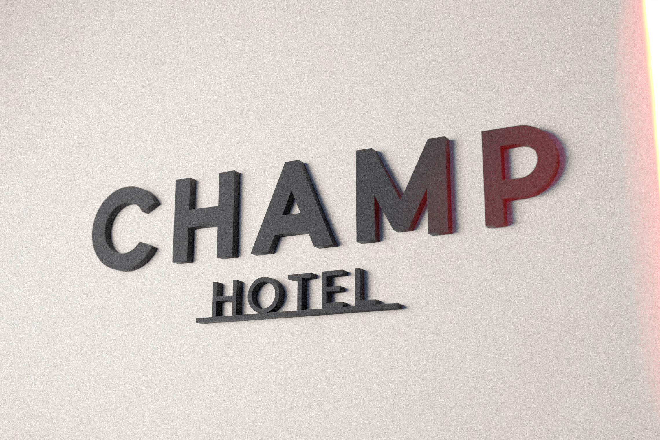 A gray 'Champ Hotel' sign is mounted on a white wall, slightly angled and lit by ambient light with an orange color cast on the right edge.
