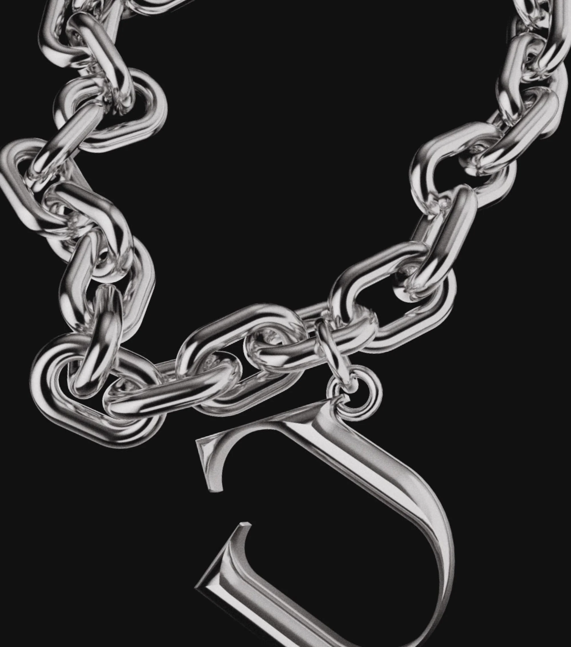 Silver chain necklace with an initial pendant against a dark background, studio shot for fashion or jewelry advertising.