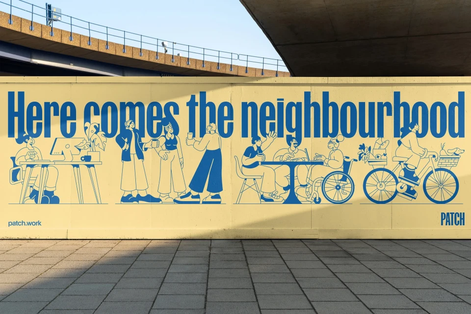 Illustration of community members on a yellow advertising billboard under an overpass, featuring 'Here comes the neighbourhood' text.