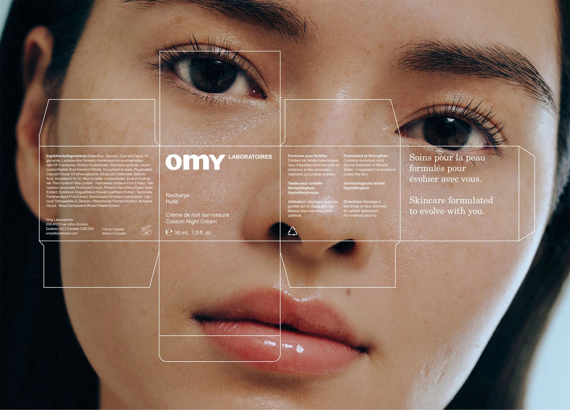 Close-up of Asian woman's face next to OMY Laboratoires skincare box. Focus on skincare and beauty product promotion.