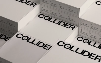 Stacked white branded product boxes featuring bold black typography and minimalist label details for Collider.