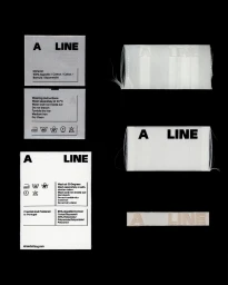Minimalist clothing tags and labels with clean typography against a deep black background for A LINE brand identity