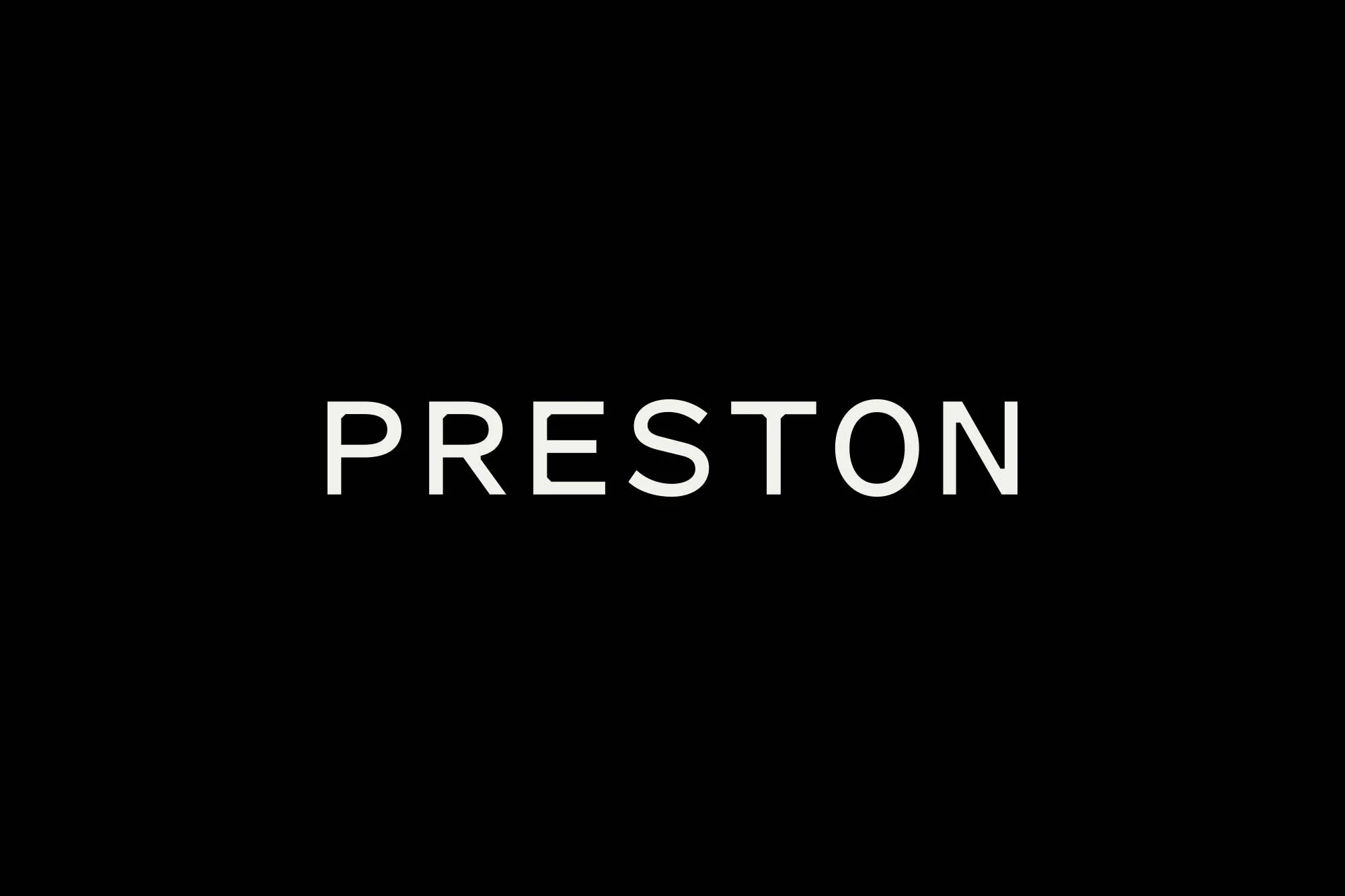 Word "PRESTON" in white bold sans-serif typeface against a stark black background, creating a high-contrast typographical image.