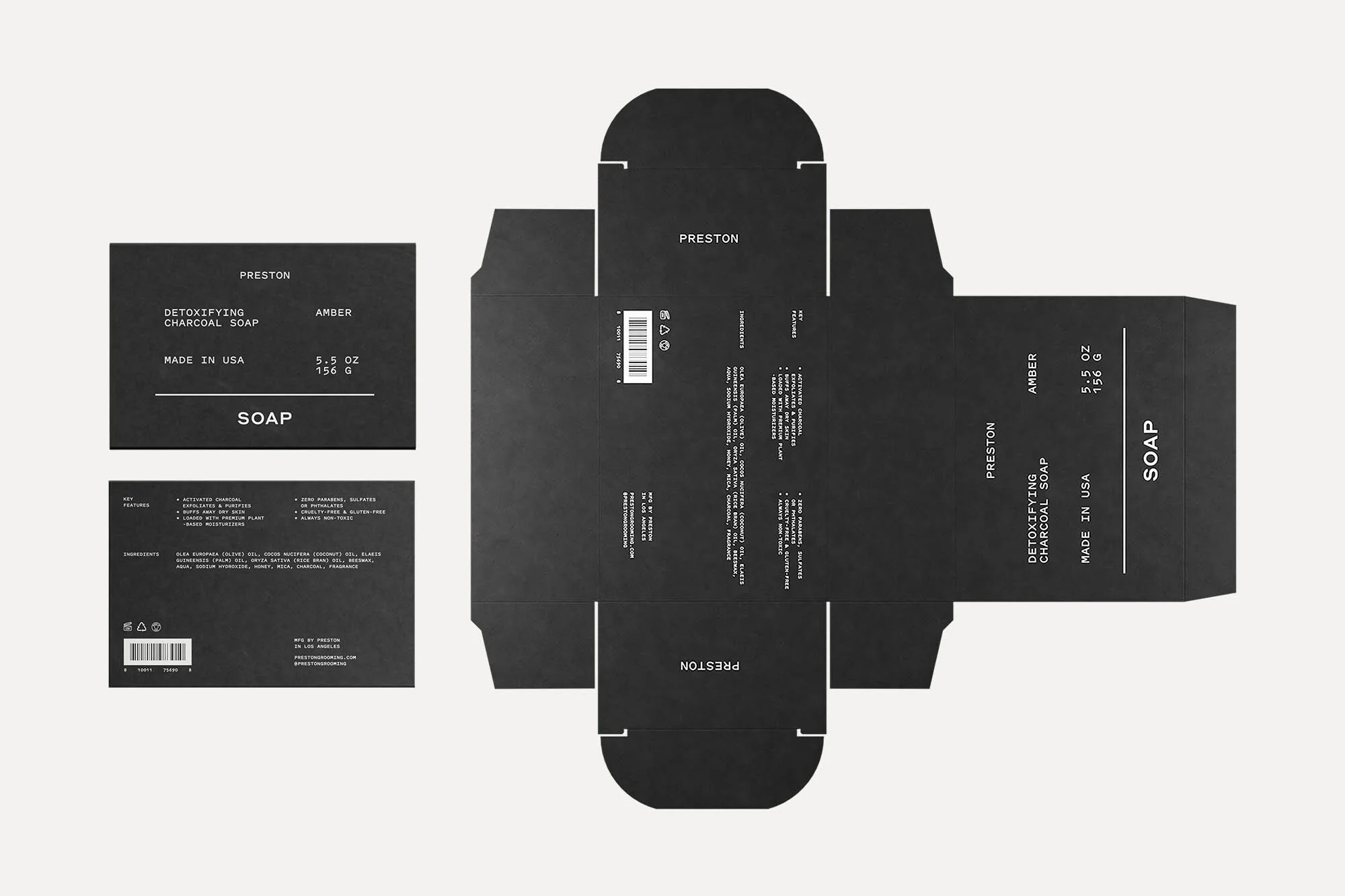 Flat lay of open black cardboard packaging template for Preston brand detoxifying charcoal soap, displayed on an off-white surface.