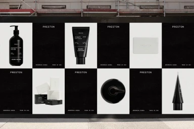 Black and white grid poster displaying Preston grooming products including bottles, tubes, and soap bars on a street wall