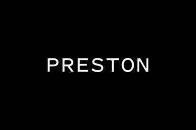 White uppercase logo typography spelling Preston centered against a solid black background.