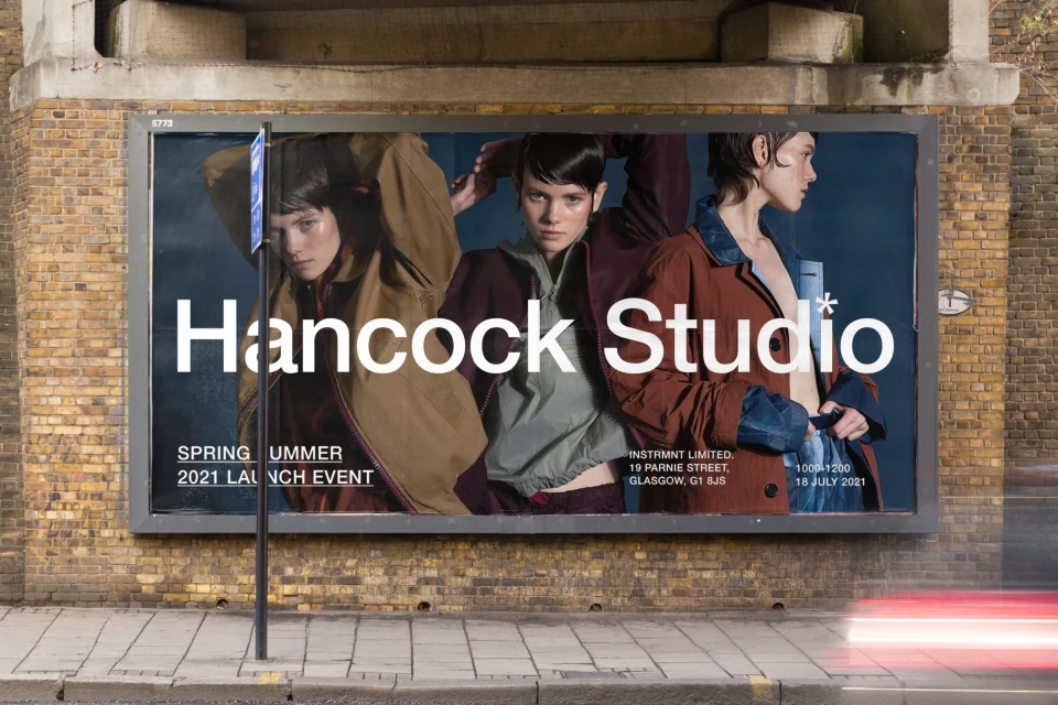 Outdoor billboard advertisement featuring three women in stylish jackets for Hancock Studio's Spring/Summer 2021 launch event.