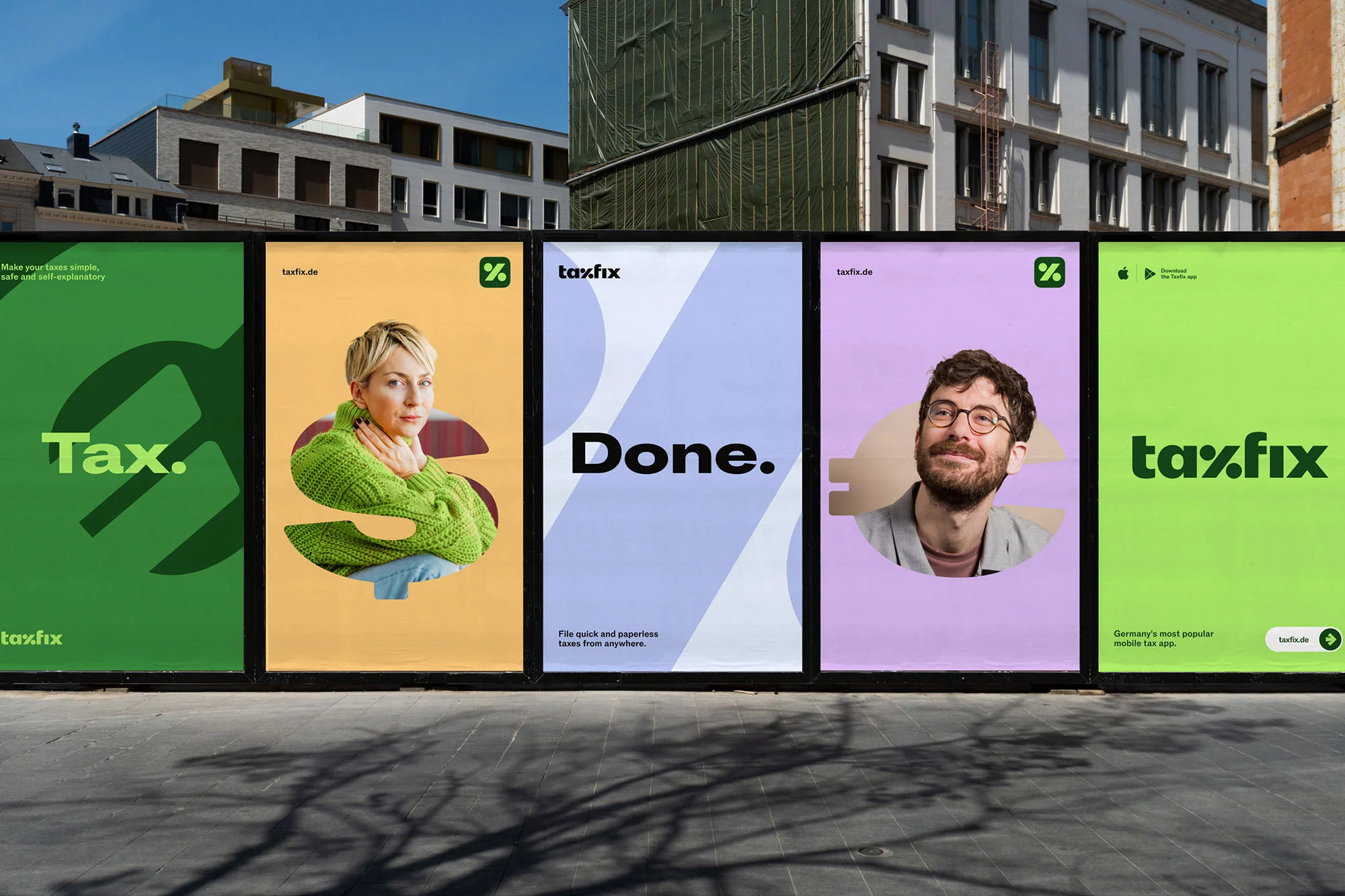 Out of home billboard advertising campaign for Taxfix featuring vibrant green and purple panels with portraits and bold typography.