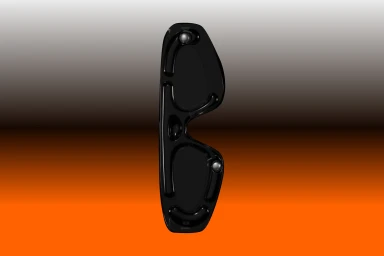 Sleek glossy black sculptural eyewear frame positioned vertically against an orange and grey gradient background.